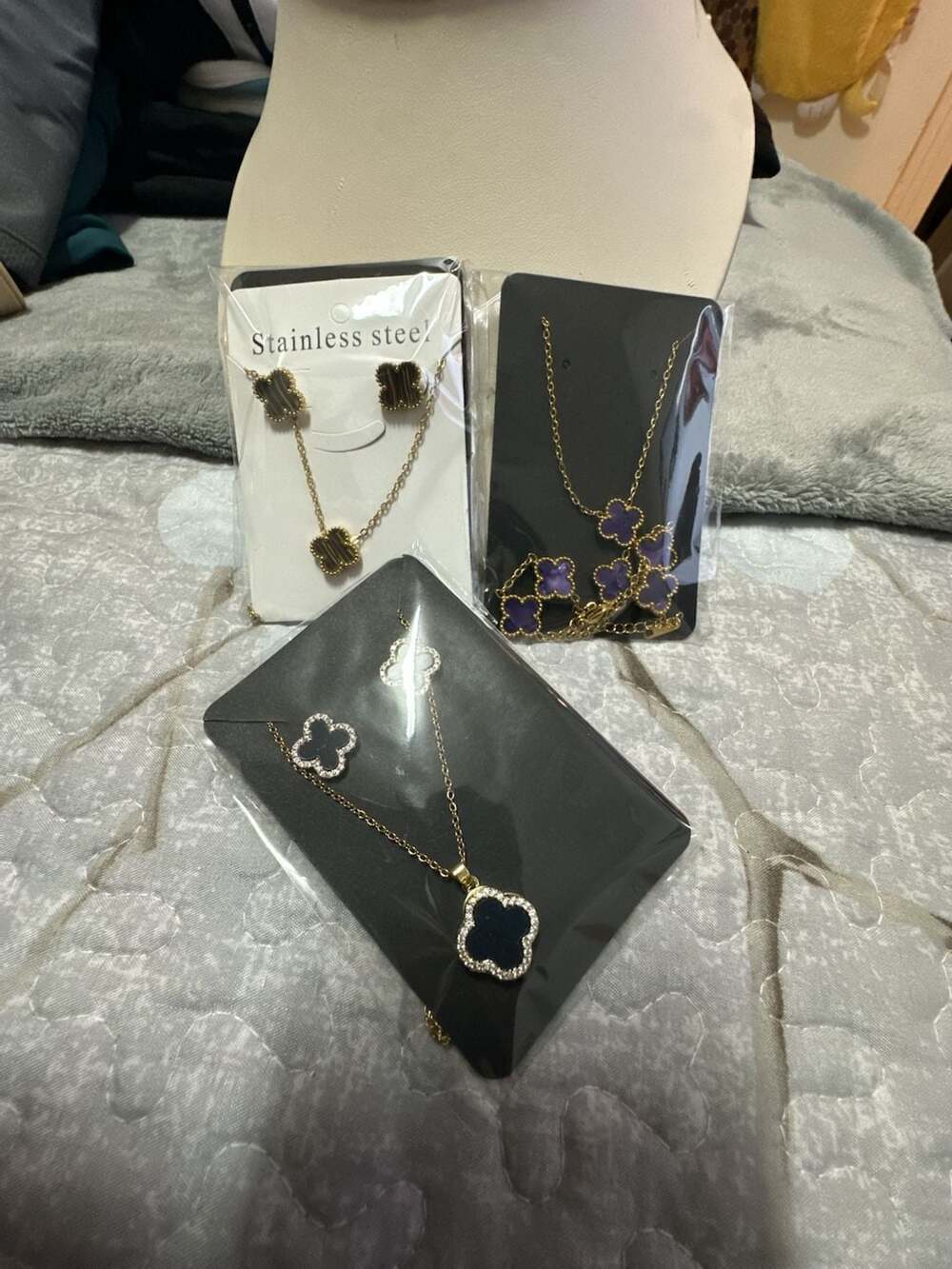 Three (3) Bundle Stainless Steel Four Leaf Clover Pendant Necklace And Earrings